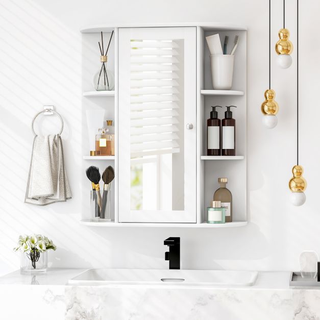 Valge seinakapp peegliga vannituppa ja elutuppa