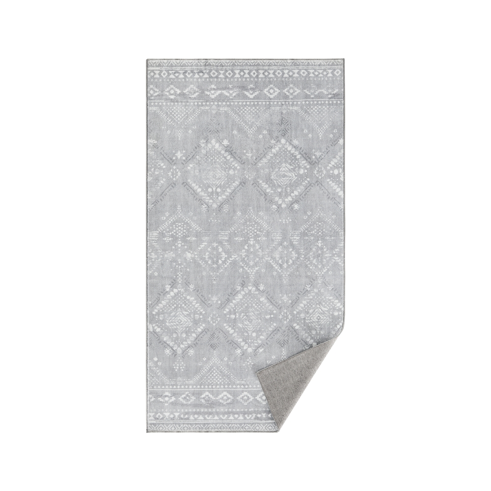 Stiilne boheemlaslik vaip hubase elutoa kaunistamiseks