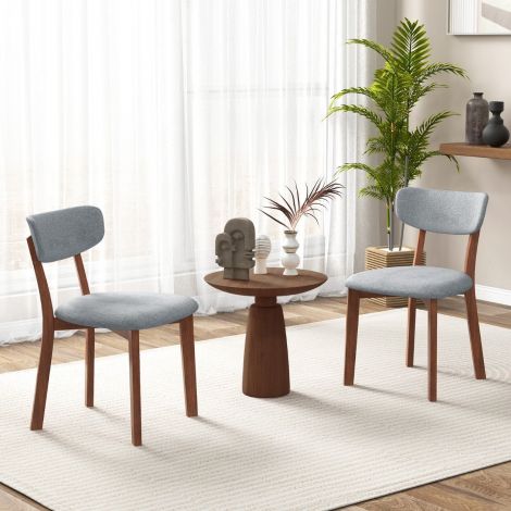 2-osaline komplekt polsterdatud seljatoega kummipuidust raamiga ja istmepadja ning mõõtmetega 51 × 47 × 82 cm hallid söögitoolid
