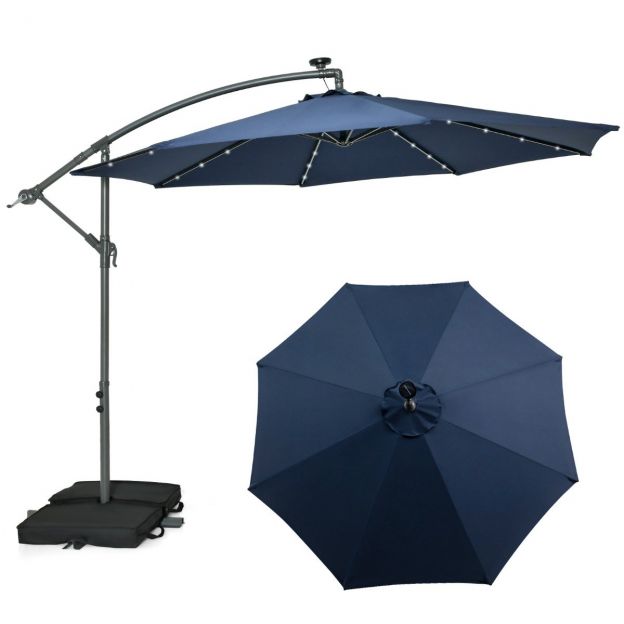 Ø300 cm rippuv päikesevari 40 päikesepatarei LED-tulega, liivakottide, väntmehhanismi ja UV-kaitsega, sinine
